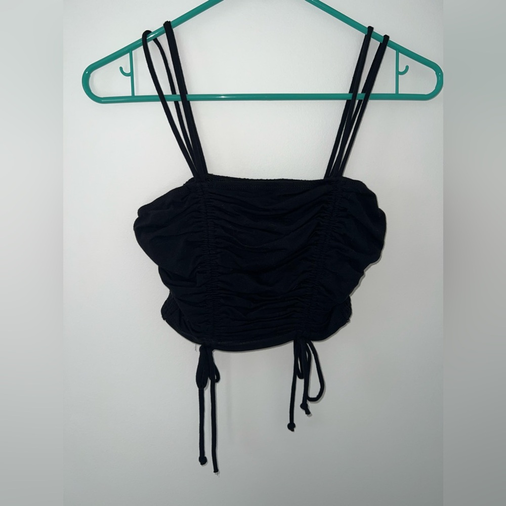 Black, ruffle going out top!